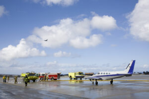 Fire Fighters training in aircraft fire response.