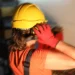 worker wearing hearing protection in workplace