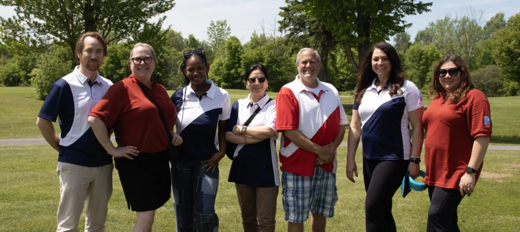 Shawn with National office staff in 2025. | Shawn parmi le personnel du bureau national, 2025.